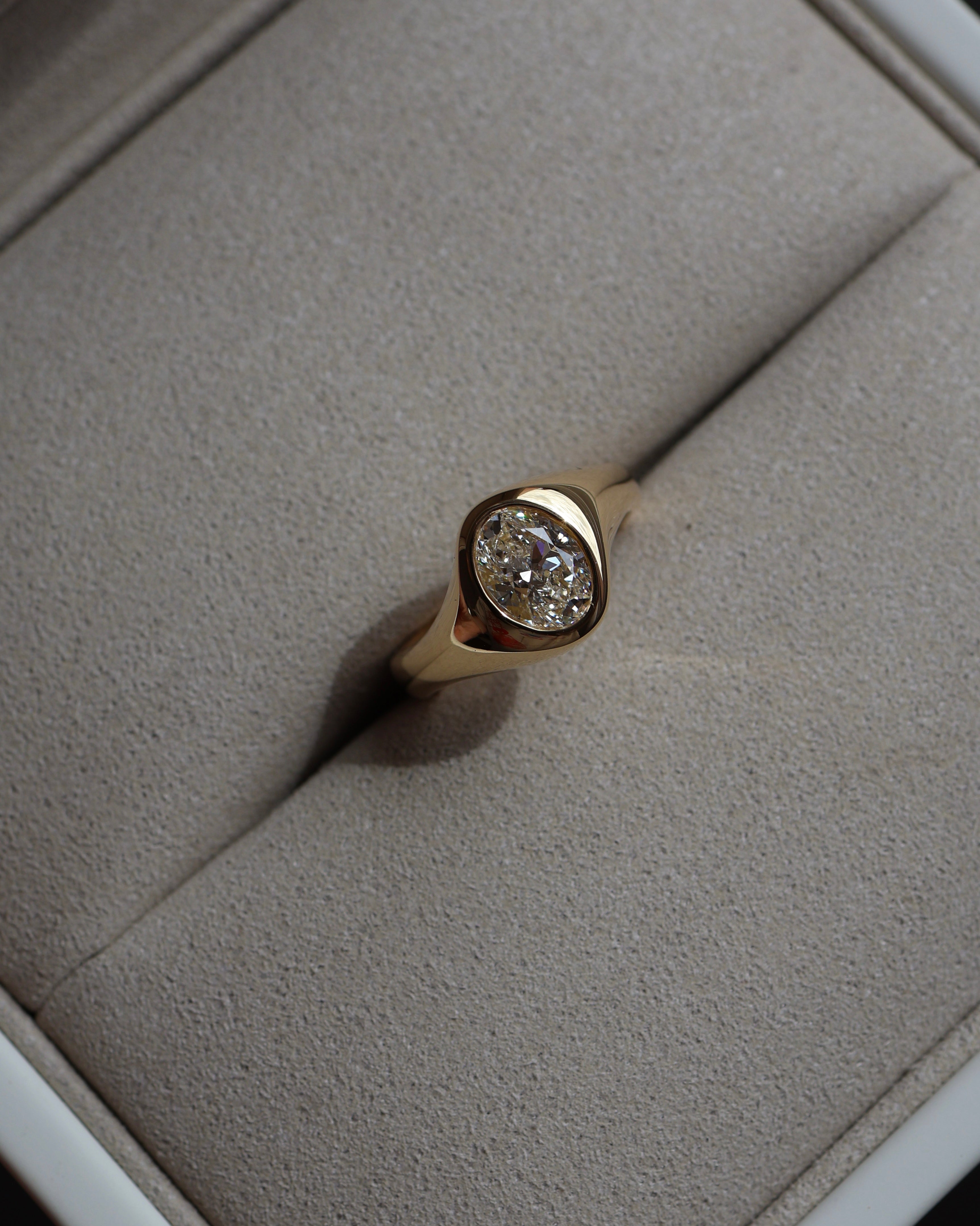 Curved oval diamond engagement ring Perth